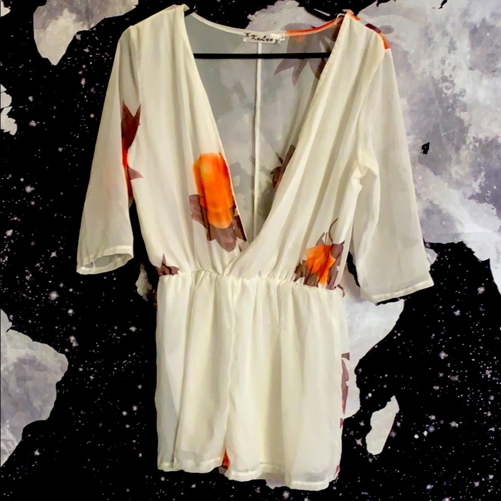 Plunging V-Neck Partial Sheer Floral Flowy Romper